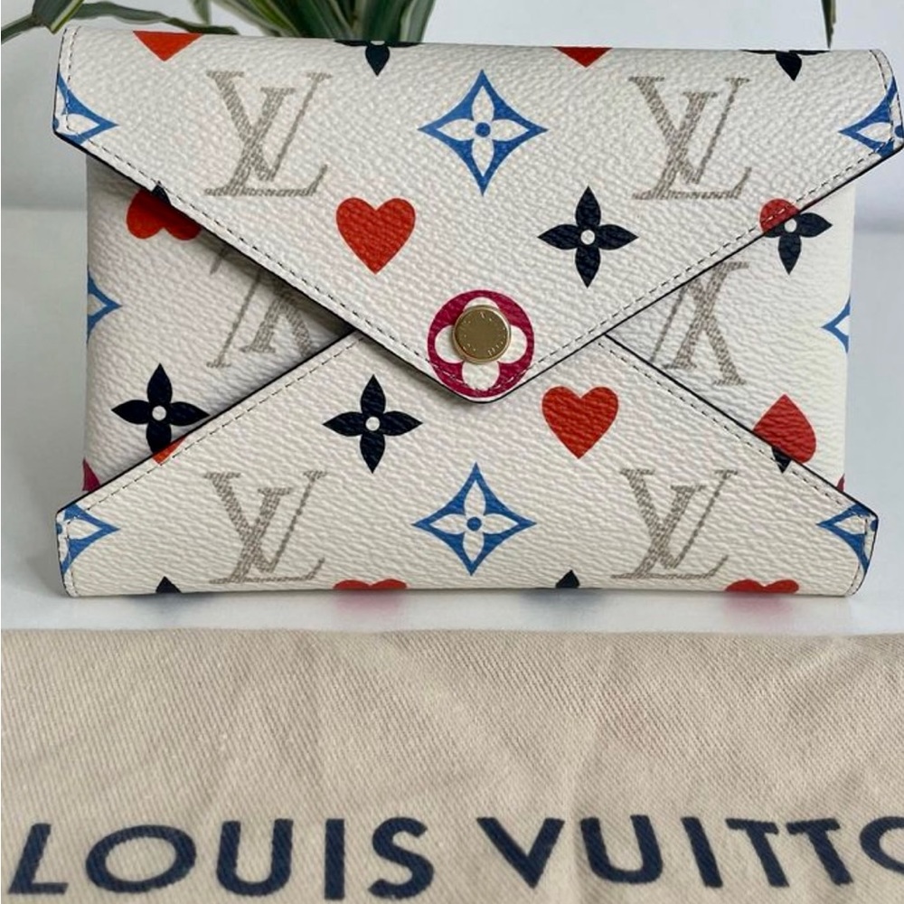 New with dust bag Kirigami Pochette